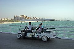 Dubai 07 Burj Al Arab 04 Taking Golf Buggy To Entrance.jpg